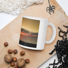 White glossy mug/old tree against the sunset - Enet Images